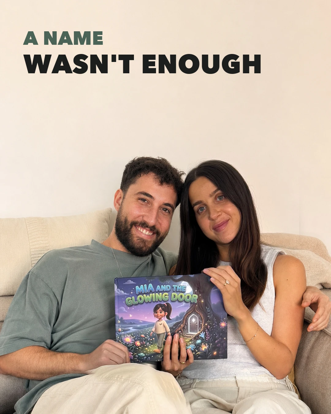 Yuval and Ella holding Mia and the Glowing Door, their daughter’s Tippytale hardcover